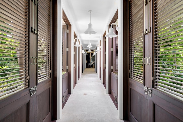 corridor with light colored carpet