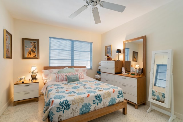 228-230 Apache St, Tavernier, FL 33070 - bedroom featuring dark speckled floor and ceiling fan