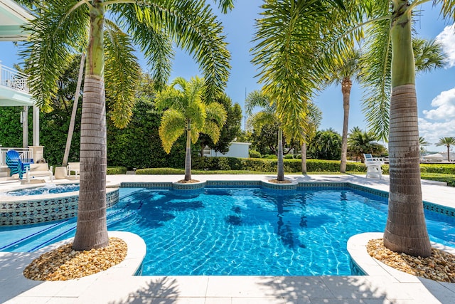 outdoor pool featuring a patio