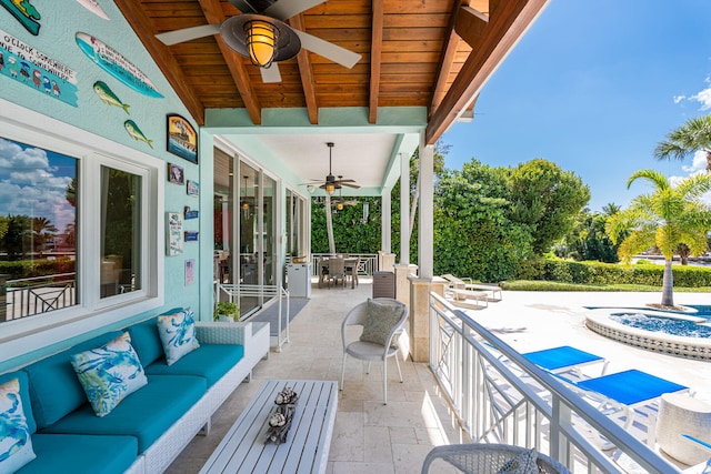 view of patio featuring an outdoor living space, outdoor dining area, and ceiling fan