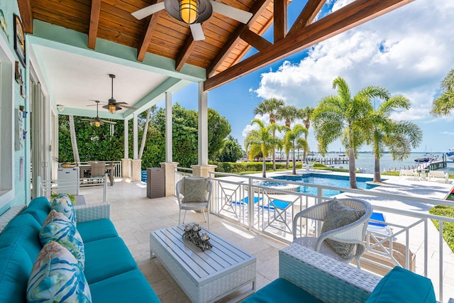 view of patio with an outdoor living space and ceiling fan