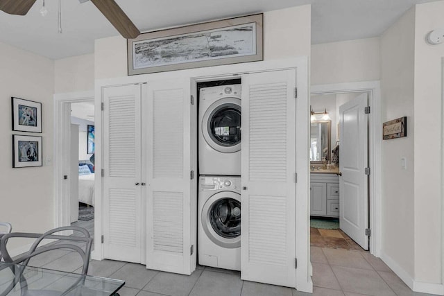 11554 5th Ave, Ocean, Marathon, FL 33050 - laundry room with stacked washer / drying machine, light tile patterned floors, baseboards, and ceiling fan