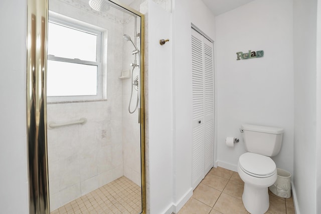 11554 5th Ave, Ocean, Marathon, FL 33050 - full bath with a closet, a shower stall, toilet, and tile patterned floors
