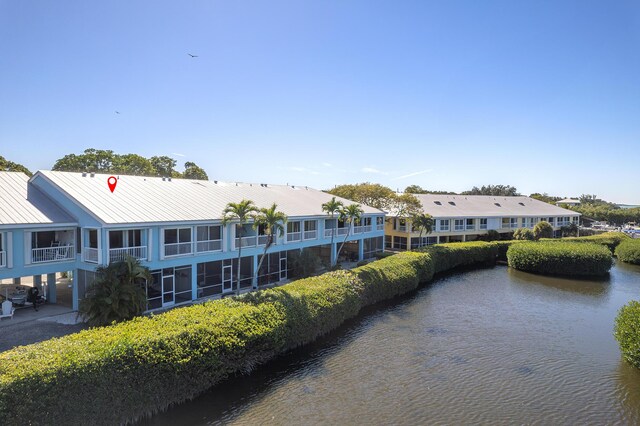 exterior space with a water view