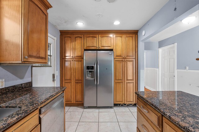 unfurnished room with light tile patterned floors, recessed lighting, and baseboards