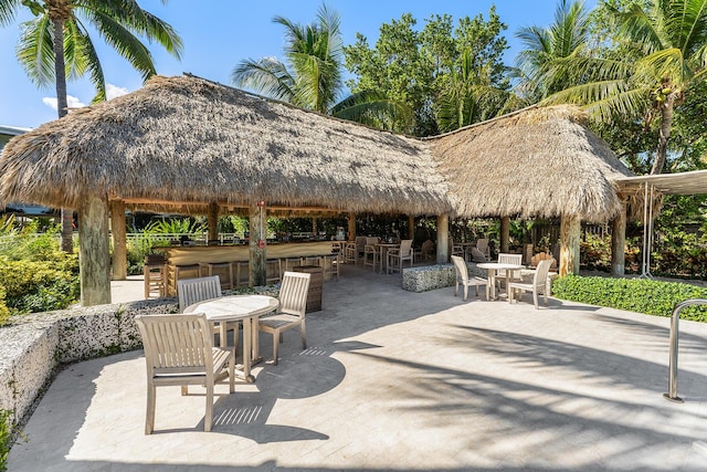 82779 Old Hwy Unit 21, Islamorada, FL 33036 - view of patio / terrace with a gazebo and outdoor dining space