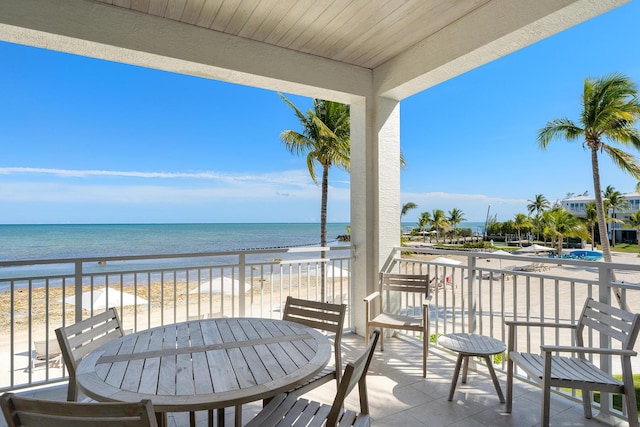82779 Old Hwy Unit 21, Islamorada, FL 33036 - view of patio featuring view of water and beach