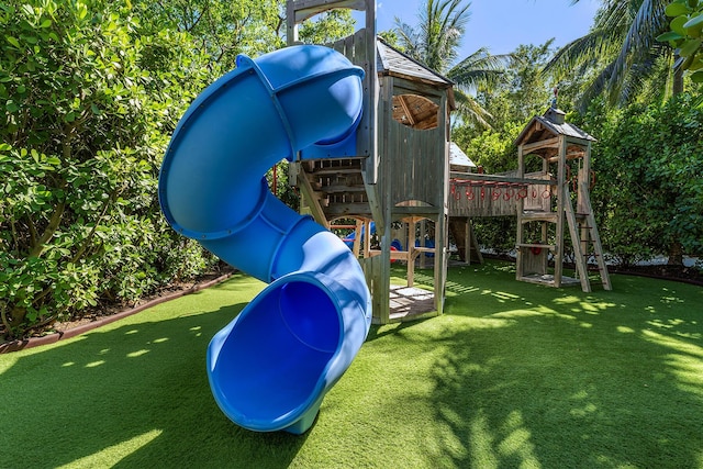 82779 Old Hwy Unit 21, Islamorada, FL 33036 - view of playground featuring a lawn