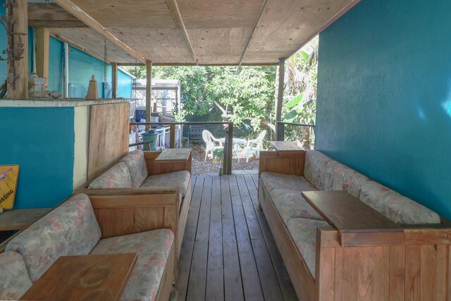 wooden deck with an outdoor hangout area