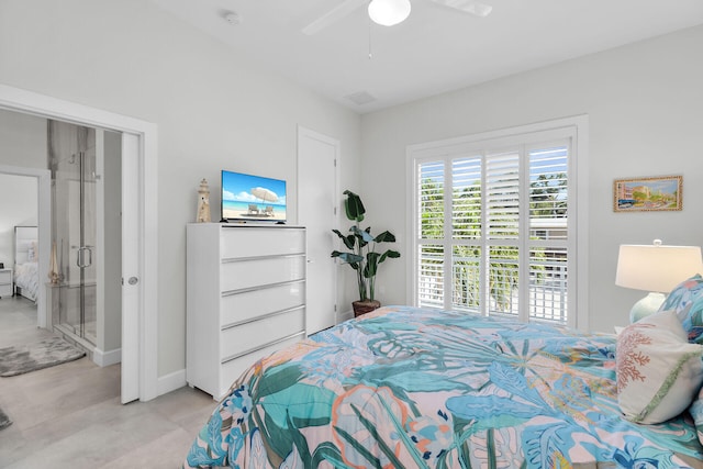 bedroom with ceiling fan and baseboards