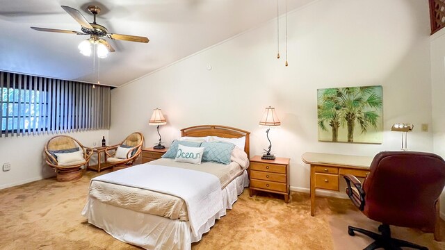 carpeted bedroom featuring ceiling fan and vaulted ceiling