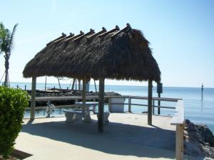 exterior space with a gazebo and a water view