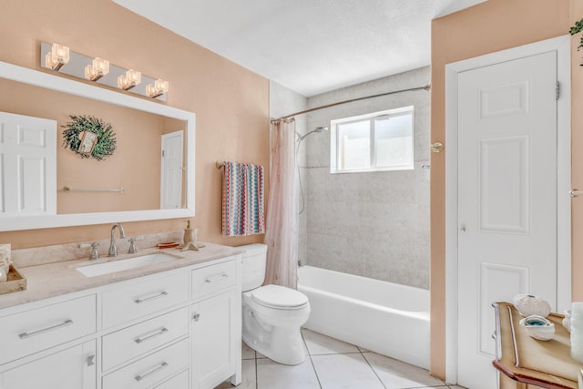 bathroom with vanity, toilet, shower / bath combo with shower curtain, and tile patterned floors