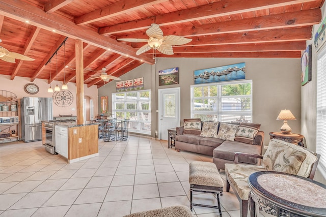 living area featuring ceiling fan, wood ceiling, and light tile patterned floors