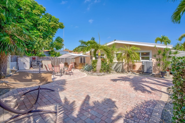 view of patio / terrace featuring fence and outdoor dining space