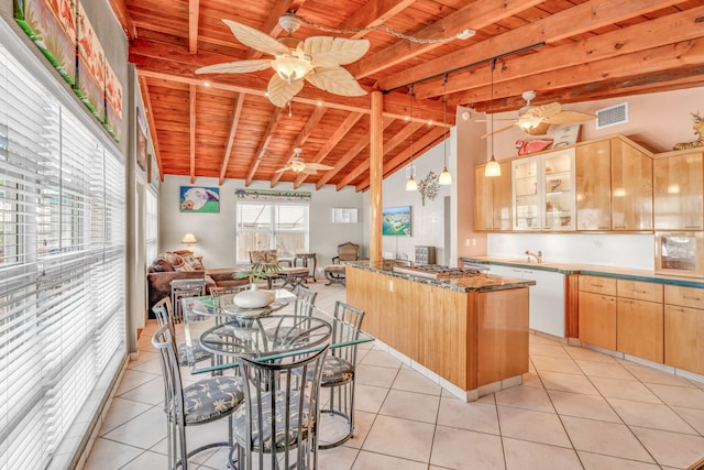 kitchen with wood ceiling, lofted ceiling with beams, a ceiling fan, and light brown cabinets