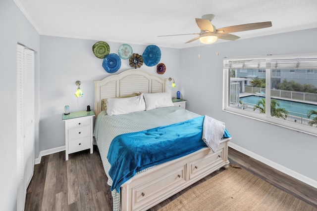 40 High Point Rd Unit C105, Tavernier, FL 33070 - bedroom with wood finished floors, ceiling fan, and ornamental molding