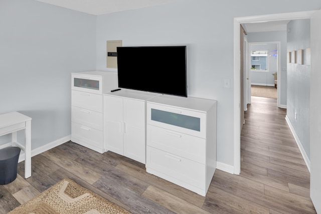 40 High Point Rd Unit C105, Tavernier, FL 33070 - unfurnished living room with baseboards and wood finished floors
