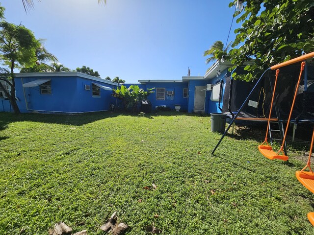 view of yard featuring a trampoline