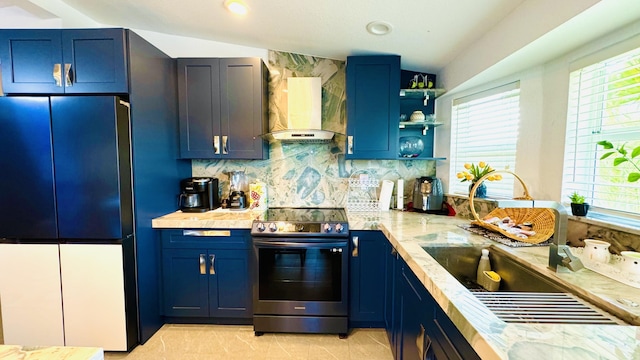 18 W Circle Dr, Saddle Bunch, FL 33040 - kitchen featuring blue cabinets, wall chimney range hood, stainless steel electric range, and refrigerator