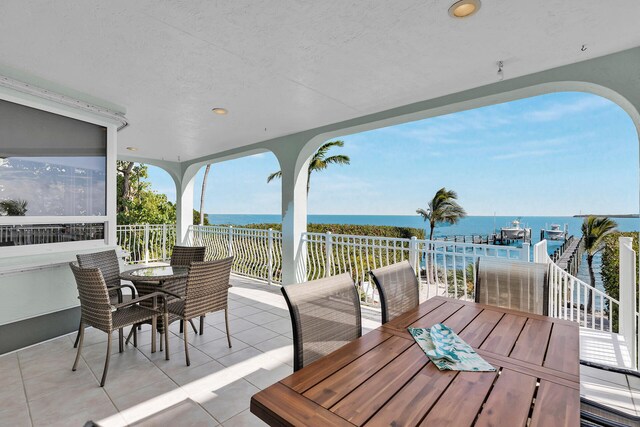 view of patio featuring a water view