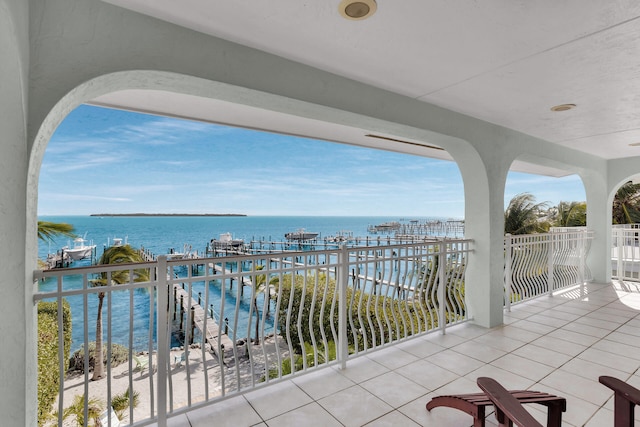 balcony featuring a water view