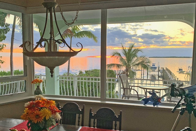 sunroom with a water view