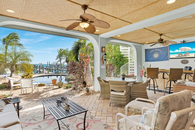 view of patio / terrace with ceiling fan