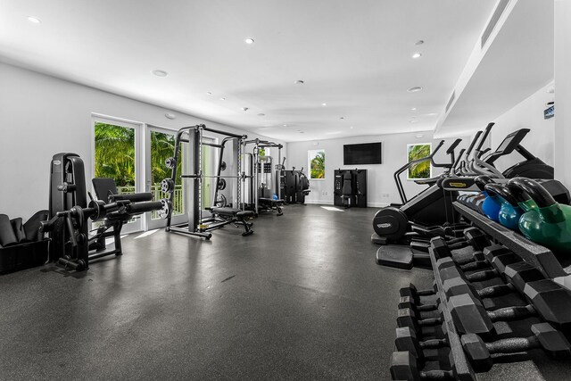 gym with a wealth of natural light