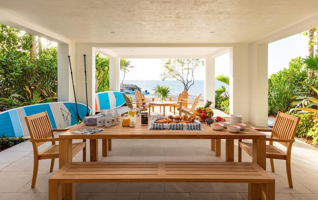 view of patio / terrace with a water view