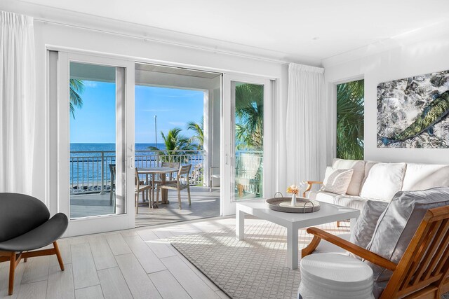 interior space featuring a water view and plenty of natural light