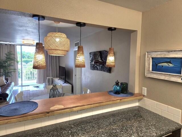 88500 Overseas Hwy Unit 301, Tavernier, FL 33070 - detailed view of a textured wall and decorative backsplash
