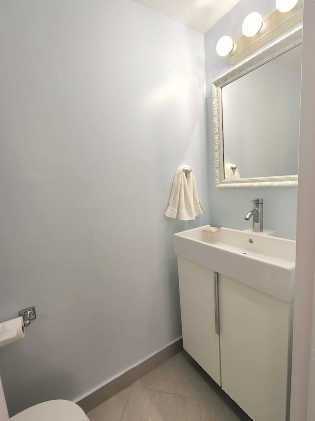 88500 Overseas Hwy Unit 301, Tavernier, FL 33070 - half bathroom with tile patterned floors and vanity