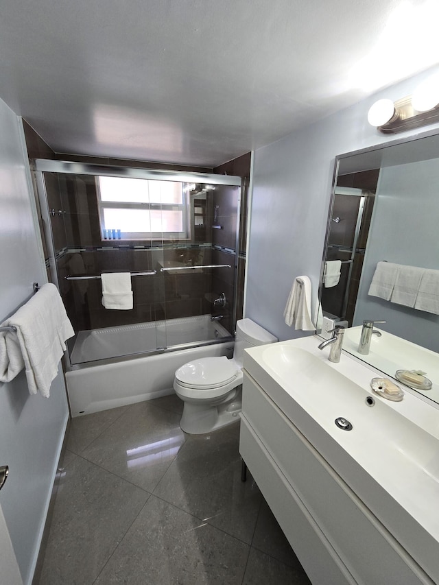 88500 Overseas Hwy Unit 301, Tavernier, FL 33070 - bathroom with vanity and bath / shower combo with glass door
