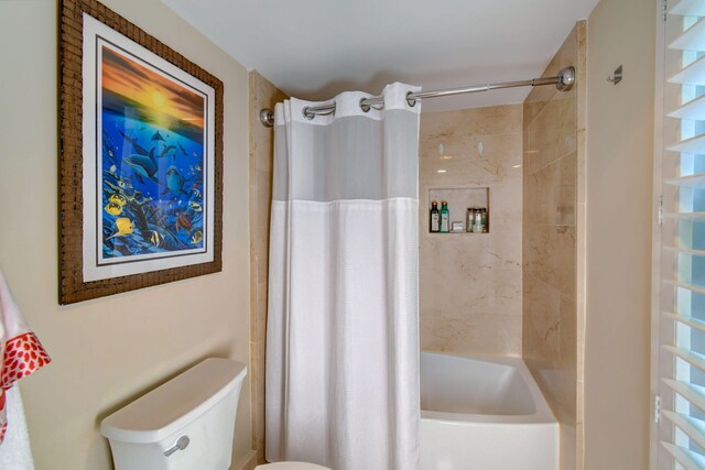 8302 Marina Villas Dr Unit 8302, Duck, FL 33050 - bathroom featuring toilet and shower / bath combo with shower curtain