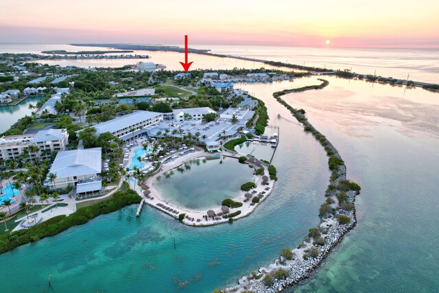 8302 Marina Villas Dr Unit 8302, Duck, FL 33050 - aerial view at dusk with a water view
