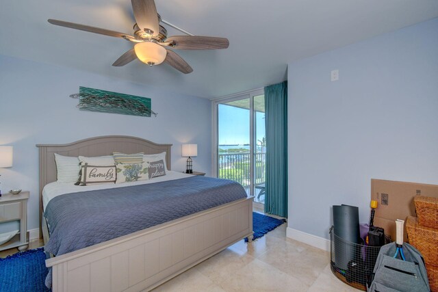 8302 Marina Villas Dr Unit 8302, Duck, FL 33050 - bedroom with access to exterior and ceiling fan