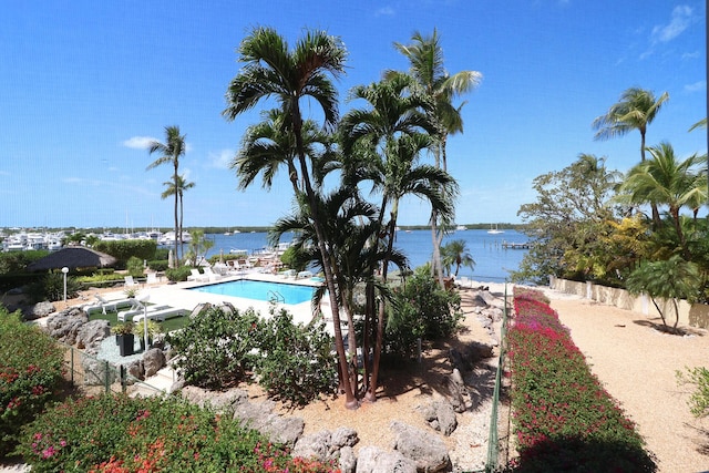 community pool featuring a water view