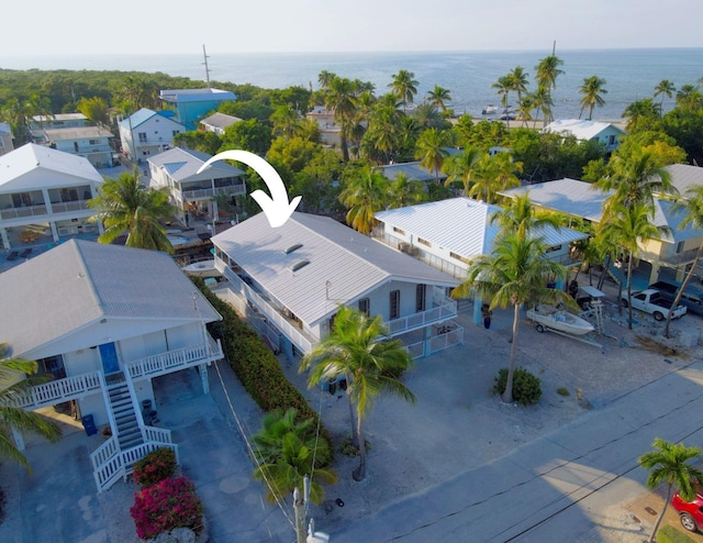 bird's eye view with a water view