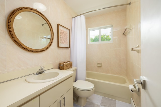 full bathroom with shower / bath combination with curtain, vanity, toilet, and tile walls