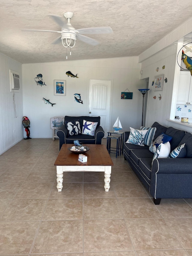 16 Shoreland Dr, Key Largo, FL 33037 - living area featuring light tile patterned floors, ceiling fan, and a textured ceiling