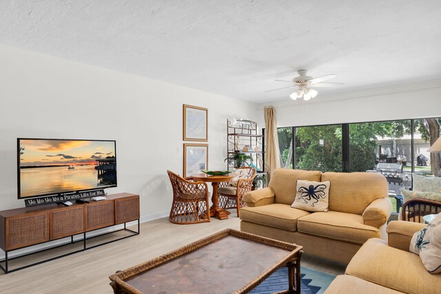87200 Overseas Hwy Unit O9, Islamorada, FL 33036 - living area featuring wood finished floors and a ceiling fan