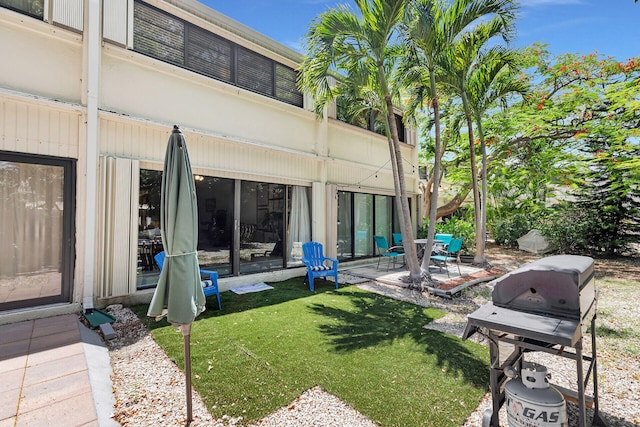 87200 Overseas Hwy Unit O9, Islamorada, FL 33036 - rear view of property with a patio area and a yard