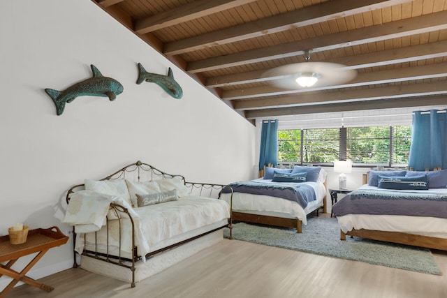 87200 Overseas Hwy Unit O9, Islamorada, FL 33036 - bedroom with wood finished floors, a wooden ceiling with exposed beams, and ceiling fan