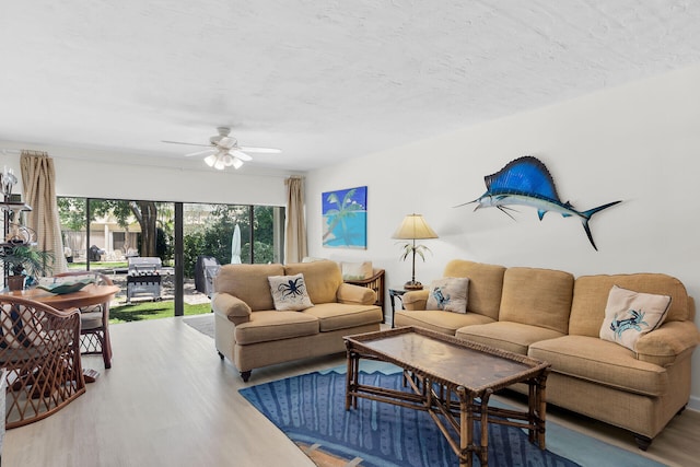 87200 Overseas Hwy Unit O9, Islamorada, FL 33036 - living area featuring wood finished floors and ceiling fan