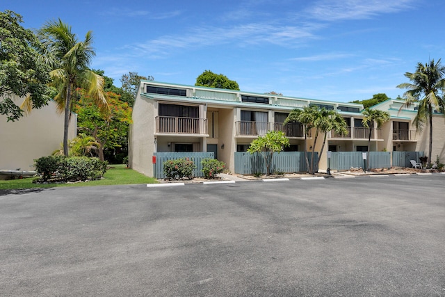 87200 Overseas Hwy Unit O9, Islamorada, FL 33036 - view of building exterior featuring uncovered parking
