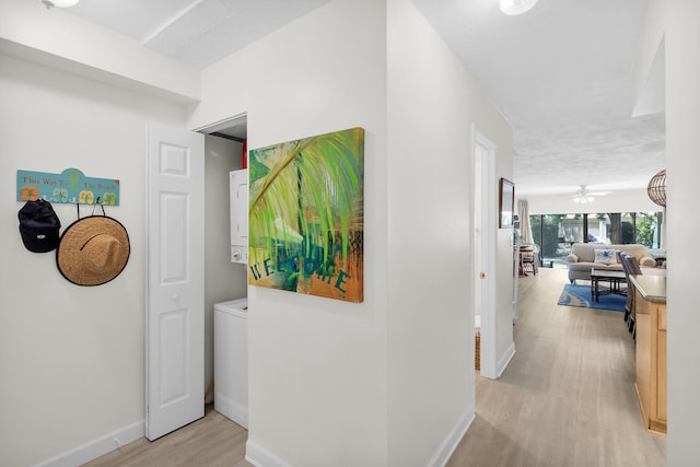 87200 Overseas Hwy Unit O9, Islamorada, FL 33036 - hallway featuring light wood-style flooring and baseboards