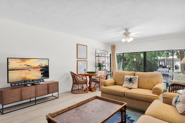 87200 Overseas Hwy Unit O9, Islamorada, FL 33036 - living area featuring wood finished floors and a ceiling fan