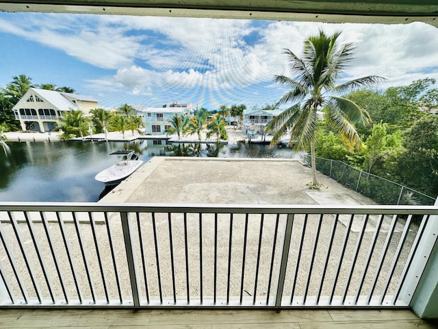 view of water feature with a dock