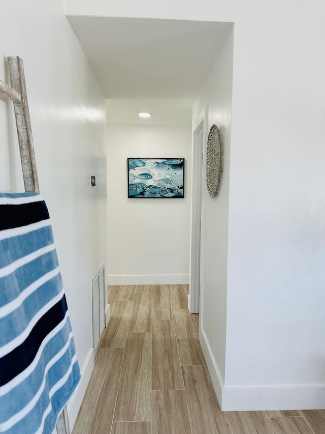 hall featuring light hardwood / wood-style flooring